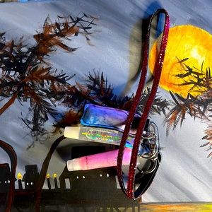 Handmade lipgloss lanyard.